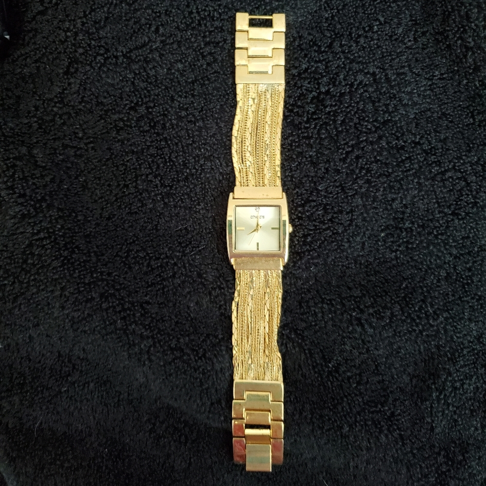 Chico's gold watch